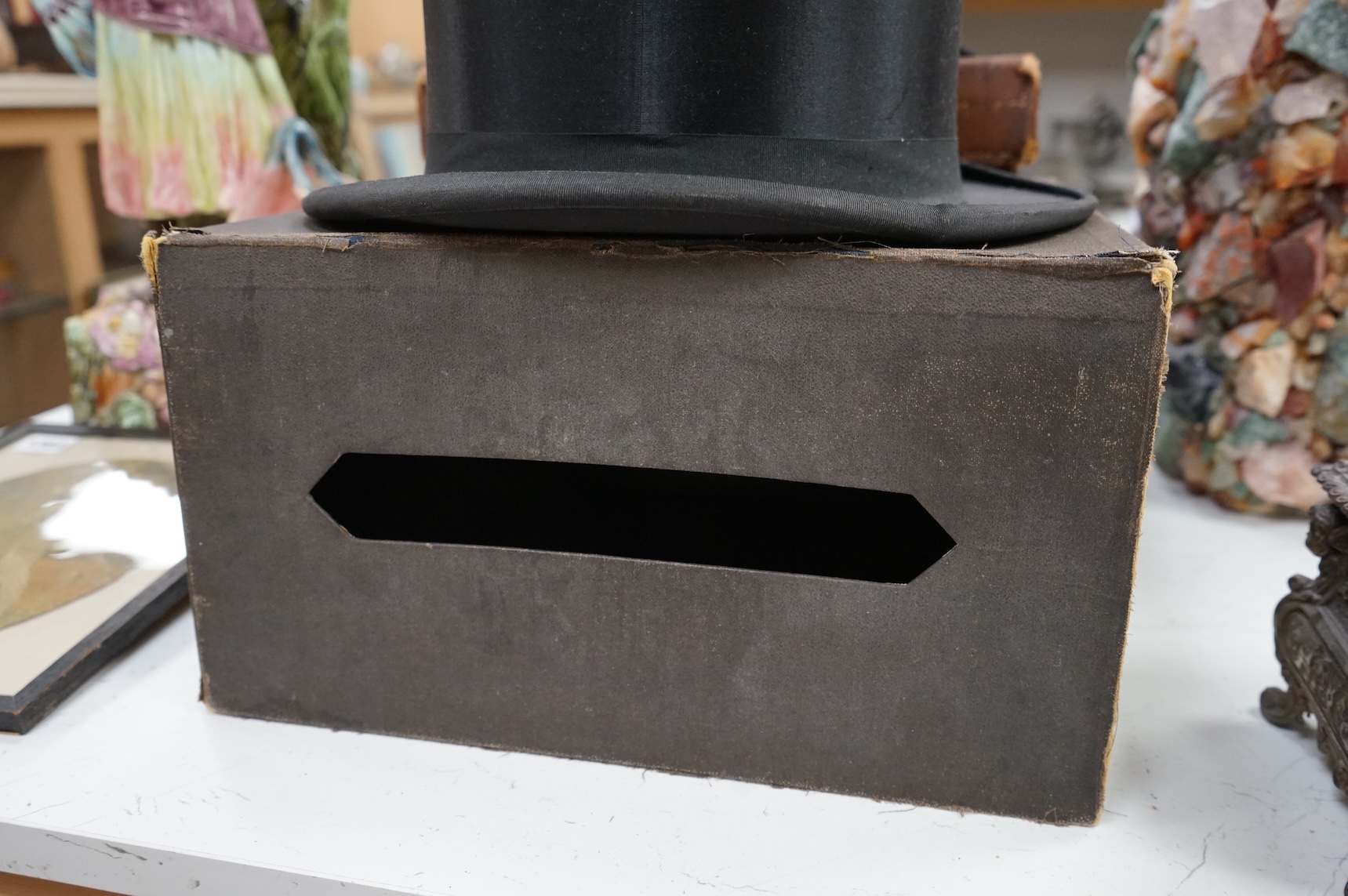 A Scott & Co. top hat with brush in leather case, together with a cased opera hat.